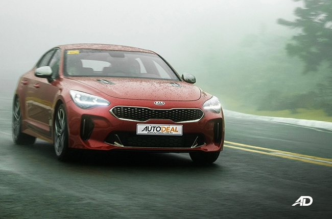 Kia Stinger exterior red road test 