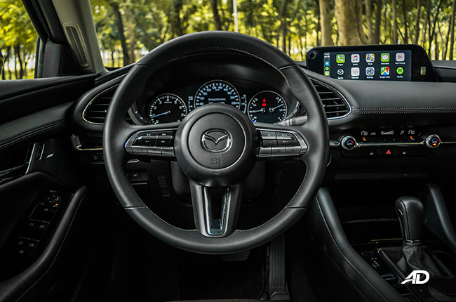mazda3 premium review road test steering wheel interior