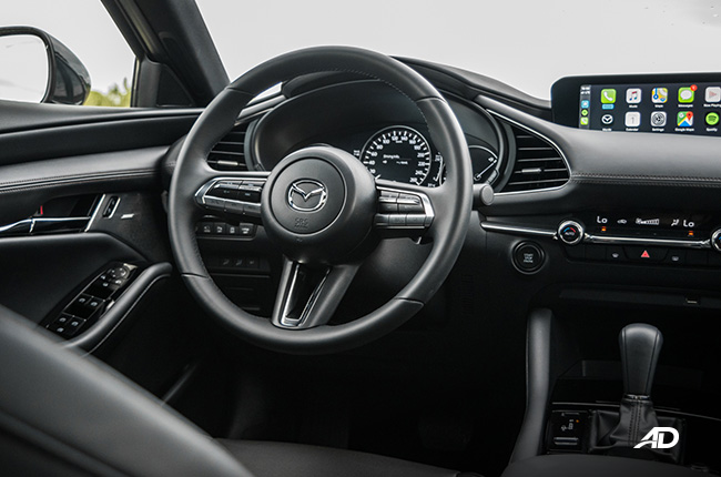 mazda3 sportback review road test steering wheel interior