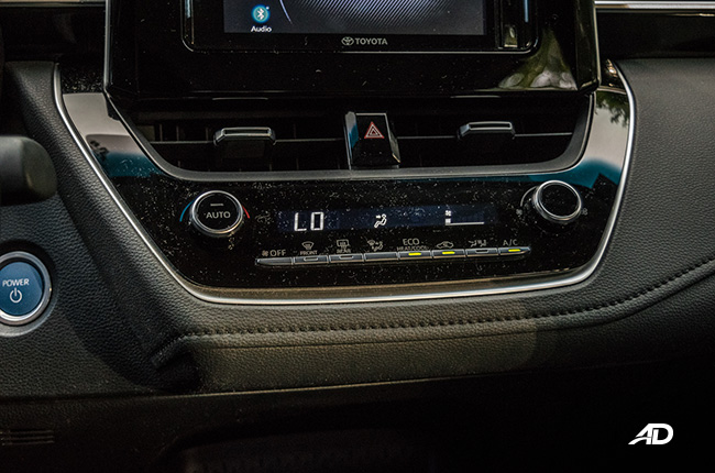 toyota corolla altis hybrid review road test climate control interior