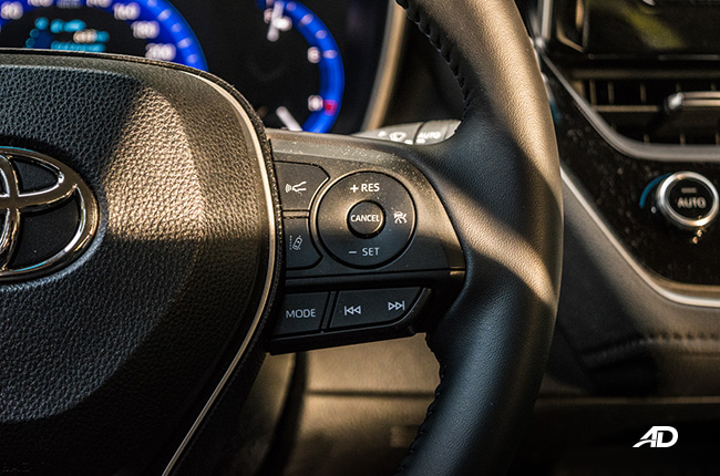 toyota corolla altis hybrid review road test cruise control interior