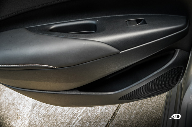 toyota corolla altis hybrid review road test door pockets interior