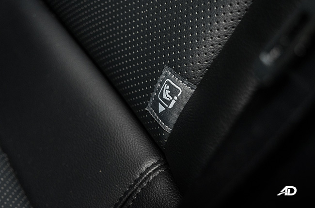 toyota corolla altis hybrid review road test isofix interior