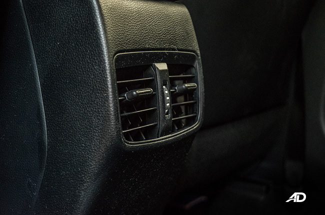 toyota corolla altis hybrid review road test rear aircon vents interior