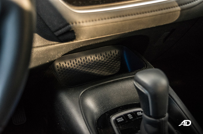 toyota corolla altis hybrid review road test smartphone cradle interior